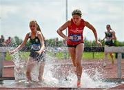 21 June 2025; Emma Brennan of Moyne Community School, representing Connacht, right, and Rachel Keaney of Newbridge College, representing Leinster, compete in the girls 1500m steeplechase during the 123.ie Irish Schools Athletics Association Tailteann Games at SETU Campus in Carlow. Photo by Sam Barnes/Sportsfile