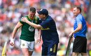 29 June 2025; Meath manager Robbie Brennan, centre, speaks with Bryan Menton, left, as he leaves the pitch during the GAA Football All-Ireland Senior Championship quarter-final match between Meath and Galway at Croke Park in Dublin. Photo by Shauna Clinton/Sportsfile