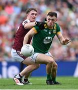 29 June 2025; Jordan Morris of Meath in action against Jack Glynn of Galway during the GAA Football All-Ireland Senior Championship quarter-final match between Meath and Galway at Croke Park in Dublin. Photo by Shauna Clinton/Sportsfile