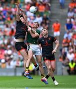 29 June 2025; Mark O'Shea of Kerry in action against Andrew Murnin of Armagh during the GAA Football All-Ireland Senior Championship quarter-final match between Armagh and Kerry at Croke Park in Dublin. Photo by Shauna Clinton/Sportsfile