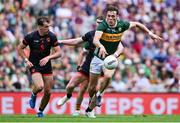 29 June 2025; David Clifford of Kerry in action against Oisin Conaty of Armagh during the GAA Football All-Ireland Senior Championship quarter-final match between Armagh and Kerry at Croke Park in Dublin. Photo by Shauna Clinton/Sportsfile