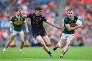 29 June 2025; Tom O'Sullivan of Kerry in action against Rory Grugan of Armagh during the GAA Football All-Ireland Senior Championship quarter-final match between Armagh and Kerry at Croke Park in Dublin. Photo by Shauna Clinton/Sportsfile