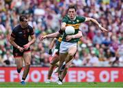 29 June 2025; David Clifford of Kerry in action against Oisin Conaty of Armagh during the GAA Football All-Ireland Senior Championship quarter-final match between Armagh and Kerry at Croke Park in Dublin. Photo by Shauna Clinton/Sportsfile