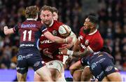 2 July 2025; Bundee Aki of British & Irish Lions is tackled by Kalani Thomas of Queensland Reds during the tour match between Queensland Reds and the British & Irish Lions at Suncorp Stadium in Brisbane, Australia. Photo by Steve Christo/Sportsfile