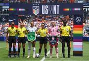 29 June 2025; Referee Janeishka Caban and her officials pose for a photograph with United States captain Lynn Biyendolo and Republic of Ireland captain Courtney Brosnan before the women's international friendly match between the USA and Republic of Ireland at TQL Stadium in Cincinnati, Ohio, USA. Photo by Stephen McCarthy/Sportsfile