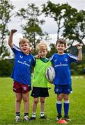 3 July 2025; Participants from left, Luke Dolan, Finn Baker and Euan King-Elmes during a Bank of Ireland Leinster Rugby Summer Camp at Stillorgan Rathfarnham RFC in Dublin. Photo by Sam Barnes/Sportsfile