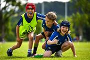 3 July 2025; Ashie Devitt, Liam Wright, and Toby Kenny during a Bank of Ireland Leinster Rugby Summer Camp at Stillorgan Rathfarnham RFC in Dublin. Photo by Sam Barnes/Sportsfile