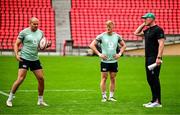 4 July 2025; Jacob Stockdale, left, and Tommy O’Brien with head coach Paul O'Connell during an Ireland rugby captain's run at Mikheil Meskhi Stadium in Tbilisi, Georgia. Photo by Brendan Moran/Sportsfile