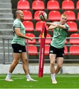 4 July 2025; Nathan Doak, right, during an Ireland rugby captain's run at Mikheil Meskhi Stadium in Tbilisi, Georgia. Photo by Brendan Moran/Sportsfile