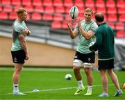 4 July 2025; Ciaran Frawley, left, Gavin Coombes and assistant coach Mike Prendergast during an Ireland rugby captain's run at Mikheil Meskhi Stadium in Tbilisi, Georgia. Photo by Brendan Moran/Sportsfile