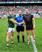 29 June 2025; Referee Brendan Cawley with team captains Gavin White of Kerry, left, and Aidan Forker of Armagh before the GAA Football All-Ireland Senior Championship quarter-final match between Armagh and Kerry at Croke Park in Dublin. Photo by Piaras Ó Mídheach/Sportsfile