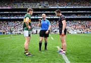 29 June 2025; Referee Brendan Cawley with team captains Gavin White of Kerry, left, and Aidan Forker of Armagh before the GAA Football All-Ireland Senior Championship quarter-final match between Armagh and Kerry at Croke Park in Dublin. Photo by Piaras Ó Mídheach/Sportsfile