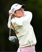 4 July 2025; Mimi Rhodes of England watches her tee shot on the first hole during day two of the 2025 KPMG Women’s Irish Open Golf Championship at Carton House Golf Club in Maynooth, Kildare. Photo by Seb Daly/Sportsfile