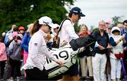 4 July 2025; Leona Maguire of Ireland, and her caddie Shane O'Connell, make their way to the first tee box during day two of the 2025 KPMG Women’s Irish Open Golf Championship at Carton House Golf Club in Maynooth, Kildare. Photo by Seb Daly/Sportsfile