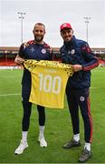 4 July 2025; Shelbourne goalkeeper Conor Kearns, left, is presented with a jersey to mark his 100th appearance for Shelbourne by head coach Joey O'Brien before the SSE Airtricity Men's Premier Division match between Shelbourne and Cork City at Tolka Park in Dublin. Photo by Sam Barnes/Sportsfile