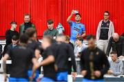 4 July 2025; A Bohemians supporter, wearing their newly launched Oasis branded jersey, takes a photograph before the SSE Airtricity Men's Premier Division match between St Patrick's Athletic and Bohemians at Richmond Park in Dublin. Photo by Stephen McCarthy/Sportsfile