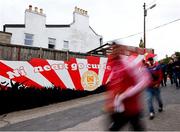 4 July 2025; St Patrick's Athletic supporters make their way to the grounds before the SSE Airtricity Men's Premier Division match between St Patrick's Athletic and Bohemians at Richmond Park in Dublin. Photo by Thomas Flinkow/Sportsfile