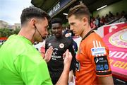 4 July 2025; Referee Rob Hennessy speaks to Bohemians goalkeeper Kacper Chorazka and St Patrick's Athletic goalkeeper Joseph Anang before the SSE Airtricity Men's Premier Division match between St Patrick's Athletic and Bohemians at Richmond Park in Dublin. Photo by Stephen McCarthy/Sportsfile