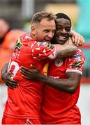 4 July 2025; Mipo Odubeko of Shelbourne, right, celebrates with teammate Paddy Barrett after scoring their side's second goal during the SSE Airtricity Men's Premier Division match between Shelbourne and Cork City at Tolka Park in Dublin. Photo by Sam Barnes/Sportsfile