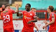 4 July 2025; Mipo Odubeko of Shelbourne, centre, celebrates with teammate Paddy Barrett after scoring their side's second goal during the SSE Airtricity Men's Premier Division match between Shelbourne and Cork City at Tolka Park in Dublin. Photo by Sam Barnes/Sportsfile