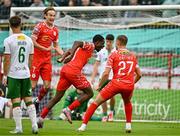 4 July 2025; Mipo Odubeko of Shelbourne celebrates with teammates Harry Wood, left, and Evan Caffrey  after scoring their side's second goal  during the SSE Airtricity Men's Premier Division match between Shelbourne and Cork City at Tolka Park in Dublin. Photo by Sam Barnes/Sportsfile