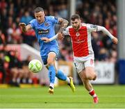 4 July 2025; Aidan Keena of St Patrick's Athletic in action against Rob Cornwall of Bohemians during the SSE Airtricity Men's Premier Division match between St Patrick's Athletic and Bohemians at Richmond Park in Dublin. Photo by Stephen McCarthy/Sportsfile