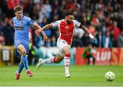 4 July 2025; Jake Mulraney of St Patrick's Athletic in action against Dayle Rooney of Bohemians during the SSE Airtricity Men's Premier Division match between St Patrick's Athletic and Bohemians at Richmond Park in Dublin. Photo by Stephen McCarthy/Sportsfile