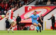 4 July 2025; Douglas James-Taylor of Bohemians in action against Joe Redmond of St Patrick's Athletic during the SSE Airtricity Men's Premier Division match between St Patrick's Athletic and Bohemians at Richmond Park in Dublin. Photo by Thomas Flinkow/Sportsfile