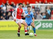 4 July 2025; Kian Leavy of St Patrick's Athletic in action against Niall Morahan of Bohemians during the SSE Airtricity Men's Premier Division match between St Patrick's Athletic and Bohemians at Richmond Park in Dublin. Photo by Thomas Flinkow/Sportsfile