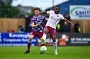4 July 2025; Malcolm Shaw of Galway United in action against Andrew Quinn of Drogheda United during the SSE Airtricity Men's Premier Division match between Drogheda United and Galway United at Sullivan & Lambe Park in Drogheda, Louth. Photo by Tyler Miller/Sportsfile