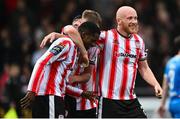4 July 2025; Sadou Diallo of Derry City celebrates with teammates including Liam Boyce, right, after scoring their side's third goal during the SSE Airtricity Men's Premier Division match between Derry City and Waterford at The Ryan McBride Brandywell Stadium in Derry. Photo by Ramsey Cardy/Sportsfile