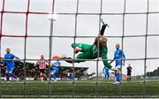 4 July 2025; Waterford goalkeeper Brad Wade fails to stop his side's first goal, scored by Liam Boyce of Derry City, left, during the SSE Airtricity Men's Premier Division match between Derry City and Waterford at The Ryan McBride Brandywell Stadium in Derry. Photo by Ramsey Cardy/Sportsfile