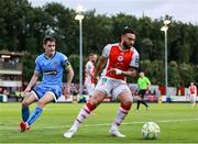 4 July 2025; Jake Mulraney of St Patrick's Athletic in action against Dawson Devoy of Bohemians during the SSE Airtricity Men's Premier Division match between St Patrick's Athletic and Bohemians at Richmond Park in Dublin. Photo by Thomas Flinkow/Sportsfile