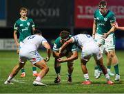 4 July 2025; Luke Murphy of Ireland is tackled by Federico Zanandrea, left, and Niccolo Beni of Italy during the World Rugby U20 Championship 2025 Pool C match between Ireland and Italy at Stadio Luigi Zaffanella in Viadana, Italy. Photo by Massimiliano Carnabuci/Sportsfile