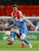4 July 2025; Ross Tierney of Bohemians in action against Barry Baggley of St Patrick's Athletic during the SSE Airtricity Men's Premier Division match between St Patrick's Athletic and Bohemians at Richmond Park in Dublin. Photo by Thomas Flinkow/Sportsfile