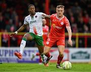 4 July 2025; JJ Lunney of Shelbourne in action against Malik Dijksteel of Cork City during the SSE Airtricity Men's Premier Division match between Shelbourne and Cork City at Tolka Park in Dublin. Photo by Sam Barnes/Sportsfile