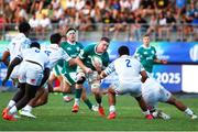 4 July 2025; Eoghan Smyth of Ireland in action against Edoardo Todaro, left, and Nicolo Corvasce of Italy during the World Rugby U20 Championship 2025 Pool C match between Ireland and Italy at Stadio Luigi Zaffanella in Viadana, Italy. Photo by Massimiliano Carnabuci/Sportsfile