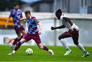 4 July 2025; Conor Kane of Drogheda United in action against Jeannot Esua of Galway United during the SSE Airtricity Men's Premier Division match between Drogheda United and Galway United at Sullivan & Lambe Park in Drogheda, Louth. Photo by Tyler Miller/Sportsfile