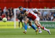 4 July 2025; Mason Melia of St Patrick's Athletic is tackled by Rob Cornwall of Bohemians during the SSE Airtricity Men's Premier Division match between St Patrick's Athletic and Bohemians at Richmond Park in Dublin. Photo by Thomas Flinkow/Sportsfile