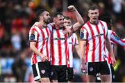 4 July 2025; Gavin Whyte of Derry City celebrates with teammate Michael Duffy, left, after scoring their side's seventh goal during the SSE Airtricity Men's Premier Division match between Derry City and Waterford at The Ryan McBride Brandywell Stadium in Derry. Photo by Ramsey Cardy/Sportsfile