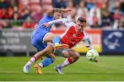 4 July 2025; Mason Melia of St Patrick's Athletic in action against Rob Cornwall of Bohemians during the SSE Airtricity Men's Premier Division match between St Patrick's Athletic and Bohemians at Richmond Park in Dublin. Photo by Stephen McCarthy/Sportsfile