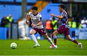4 July 2025; Axel Piesold of Galway United in action against Darragh Markey of Drogheda United during the SSE Airtricity Men's Premier Division match between Drogheda United and Galway United at Sullivan & Lambe Park in Drogheda, Louth. Photo by Tyler Miller/Sportsfile