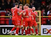 4 July 2025; JJ Lunney of Shelbourne, centre, celebrates  with teammates after scoring his side's third goal during the SSE Airtricity Men's Premier Division match between Shelbourne and Cork City at Tolka Park in Dublin. Photo by Sam Barnes/Sportsfile