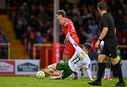 4 July 2025; Sean Boyd of Shelbourne is tackled by Cathal O'Sullivan of Cork City during the SSE Airtricity Men's Premier Division match between Shelbourne and Cork City at Tolka Park in Dublin. Photo by Sam Barnes/Sportsfile