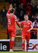 4 July 2025; JJ Lunney of Shelbourne, right, celebrates with Sean Boyd after scoring his side's third goal during the SSE Airtricity Men's Premier Division match between Shelbourne and Cork City at Tolka Park in Dublin. Photo by Sam Barnes/Sportsfile