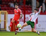 4 July 2025; Ellis Chapman of Shelbourne in action against Cathal O'Sullivan of Cork City during the SSE Airtricity Men's Premier Division match between Shelbourne and Cork City at Tolka Park in Dublin. Photo by Sam Barnes/Sportsfile
