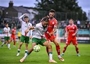 4 July 2025; Ellis Chapman of Shelbourne in action against Milan Mbeng of Cork City during the SSE Airtricity Men's Premier Division match between Shelbourne and Cork City at Tolka Park in Dublin. Photo by Sam Barnes/Sportsfile