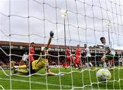 4 July 2025; Shelbourne goalkeeper Conor Kearns fails to save the shot of Kitt Nelson of Cork City, not pictured, resulting in Cork's first goal during the SSE Airtricity Men's Premier Division match between Shelbourne and Cork City at Tolka Park in Dublin. Photo by Sam Barnes/Sportsfile