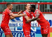 4 July 2025; Mipo Odubeko of Shelbourne, right, celebrates with Harry Wood, centre, and Evan Caffrey after scoring their side's second goal during the SSE Airtricity Men's Premier Division match between Shelbourne and Cork City at Tolka Park in Dublin. Photo by Sam Barnes/Sportsfile