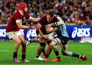 5 July 2025; Ben Earl of British & Irish Lions, supported by teammate Josh van der Flier, left, is tackled by Fergus Lee-Warner of NSW Waratahs during the tour match between NSW Waratahs and the British & Irish Lions at the Allianz Stadium in Sydney, Australia. Photo by Steve Christo/Sportsfile